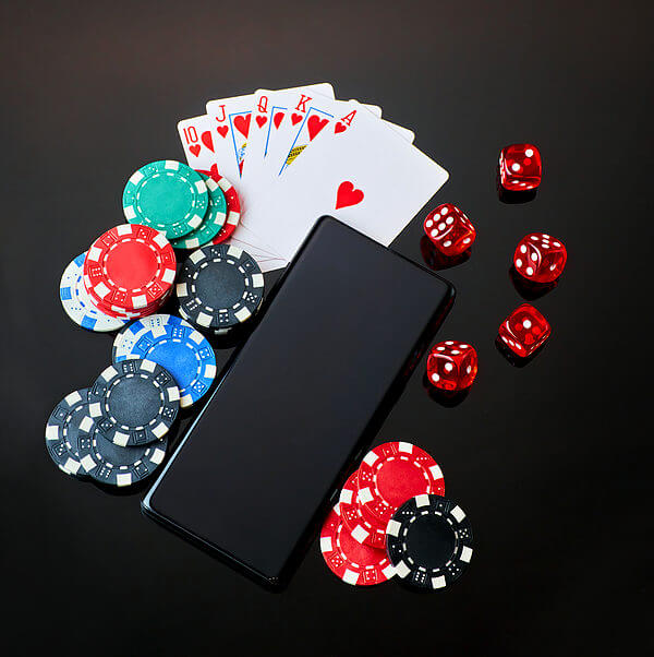 Casino Chips, Playing Cards, Dices And Mobile Phone