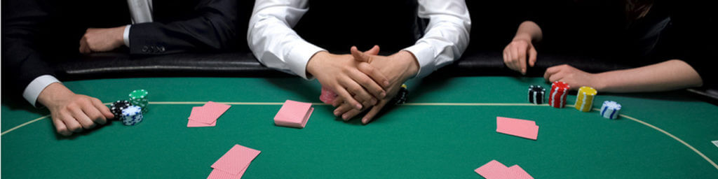 blackjack table with players and dealer